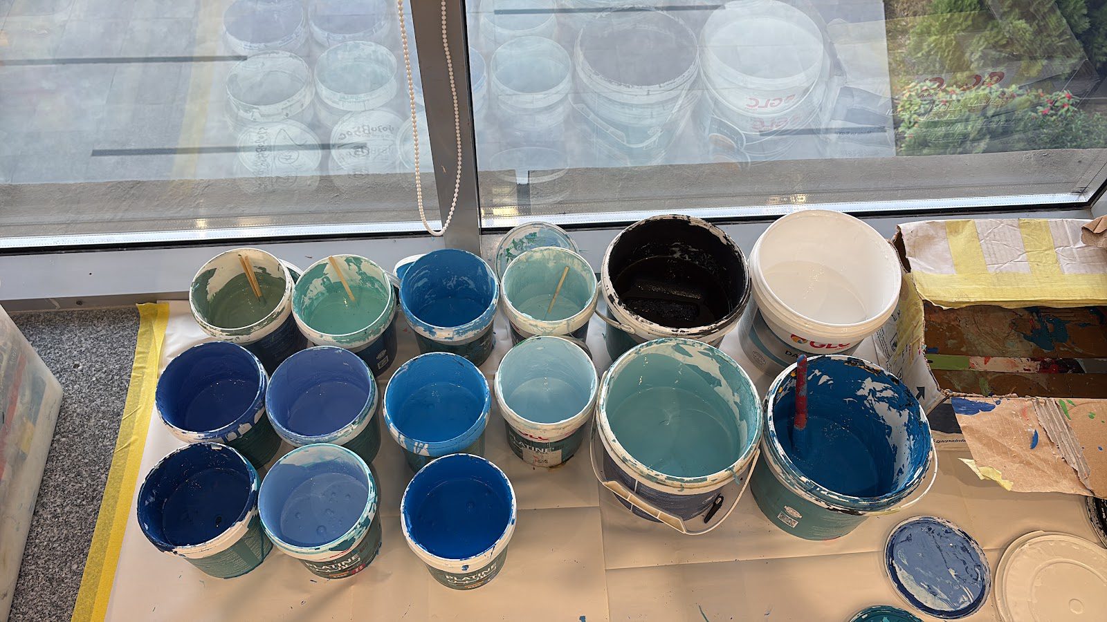 Paint pots mixed for the wall
